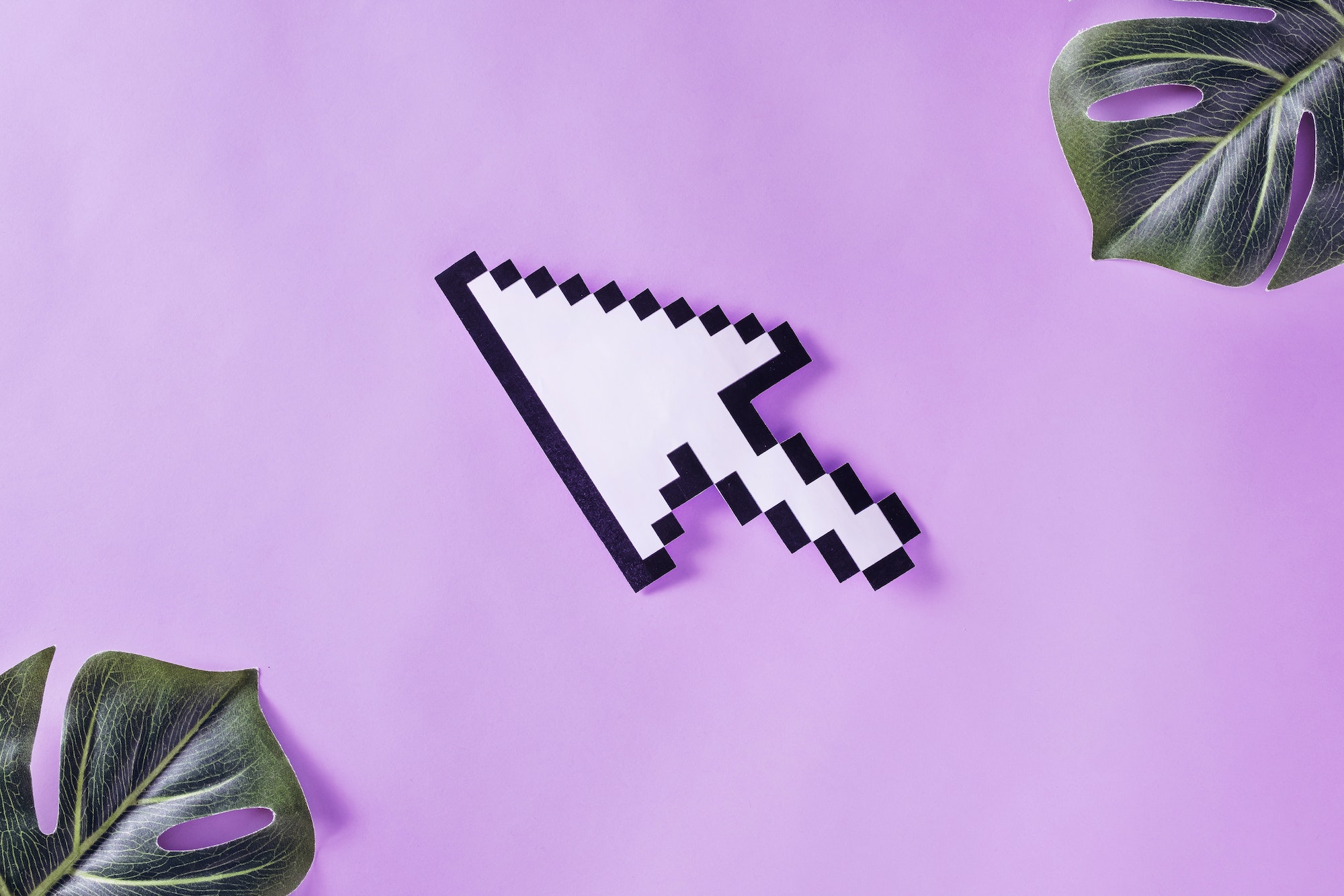 Arrow pointer is pixelated on pastel purple velvet background